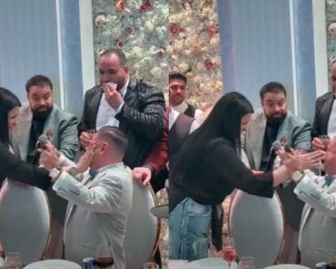 Adrian Minune, luat la palme de Raluca Drăgoi, în timpul unei cântări. Florin Salam a fost de față