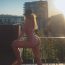 Delia s-a pozat în cele mai provocatoare poziții, purtând doar un costum de baie din două piese! GALERIE FOTO