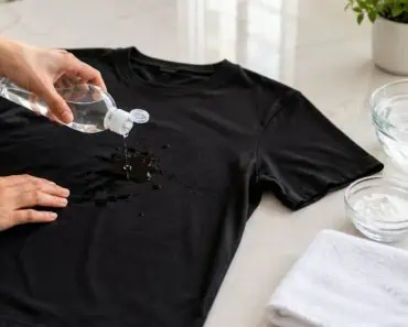 Cum scapi de o pată de grăsime de pe o bluză neagră în doar câteva minute Cum scapi de o pată de grăsime de pe o bluză neagră în doar câteva minute
