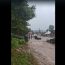 VIDEO: Prăpăd în stațiunea Bușteni. O tânără a fost luată de apă. DN 1 și mai multe străzi, inundate
